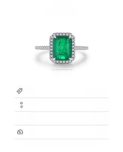 Macro detail of S925 sterling silver ring featuring a 7x9mm emerald cut green stone
