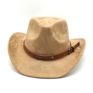 Detail of camel suede western cowboy hat with brown leather band and metal buckle