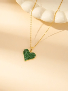 Minimalist 18K gold plated titanium steel necklace with green pavé heart pendant