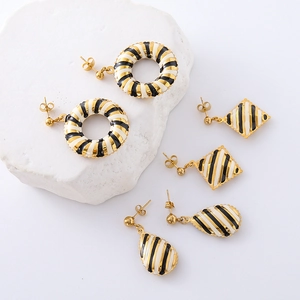 18K gold plated geometric jewelry set with black and white striped enamel patterns