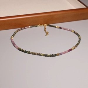 Rainbow gradient tourmaline necklace with 2mm beads and gold lobster clasp
