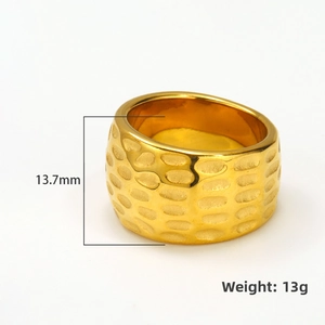 Detailed view of 13.7mm wide 18k gold plated hammered texture ring made of titanium steel