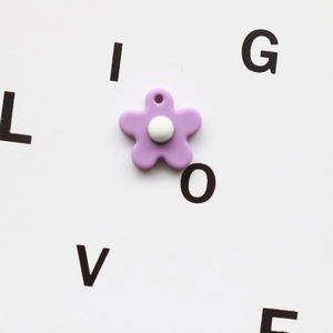 Purple floral resin charm for DIY keychains and handmade accessories with center white dot