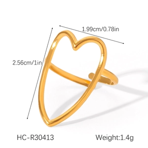 Detailed view of adjustable gold-plated heart ring with 2.56cm height measurement