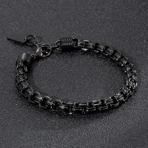 Detail view of black stainless steel box chain bracelet with industrial clasp design