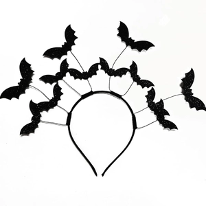 Detail of black glitter bats on a Halloween headband for costume party decoration