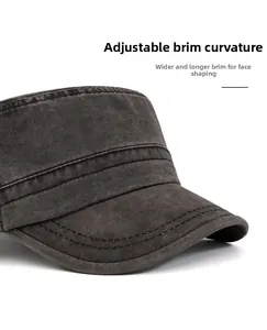 Detail of military flat top cap showing the washed fabric texture and wide curved brim