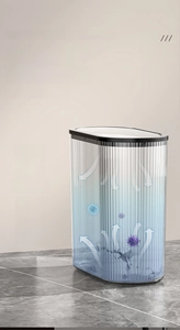 Detail view of grey slim trash bin with premium sealing lid for kitchen and bathroom