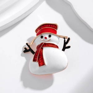 Cute snowman Christmas brooch with red hat and scarf on white display stand