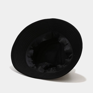 Inside view of black cotton bucket hat showing sweatband and stitching details