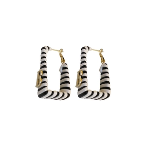 Square earrings with black and white stripes and golden B-letter pendant charm