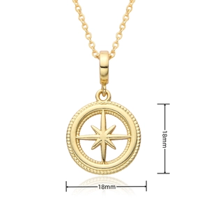 Detail showing an 18mm round gold compass pendant necklace with celestial star design