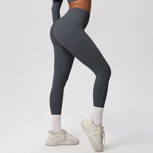Detail view of high waist dark grey yoga leggings with compression fit for fitness