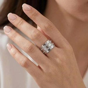 Close-up of a silver wide hammered texture stainless steel ring on model hand