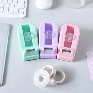 Minimalist macaron-colored desktop tape dispenser set with three rolls of assorted tape