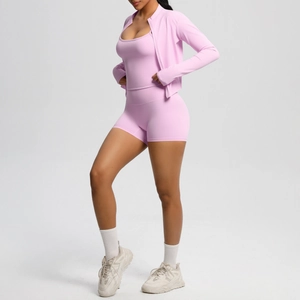 Detail of light purple three-piece yoga set with zip jacket, tank top, and high-waist shorts