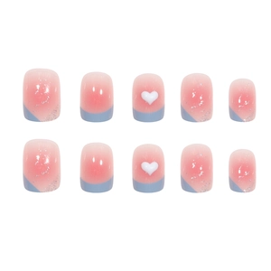 Pink and blue gradient press-on nails with silver glitter and 3D white heart charms