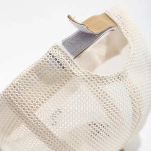 Detail of breathable mesh kids baseball cap showing adjustable velcro strap and texture