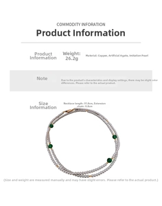 Detailed view of 91.8cm faux pearl necklace with green agate and copper accents