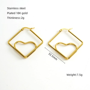 Detail view of 18K gold plated heart earrings with size and weight specifications