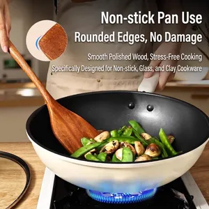 Long handle natural wooden spatula for non-stick pans used in kitchen cooking