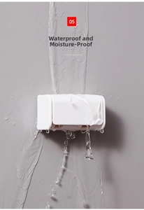 Waterproof wall-mounted storage box showing moisture resistance under running water