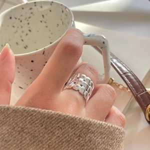 Minimalist 925 sterling silver ring with irregular woven texture and open band design