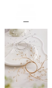 Detail of silver and gold beaded branch ornaments with crystal beads for Christmas tree