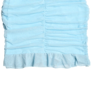 Detail view of light blue mesh fabric with shimmer texture and ruffled hemline