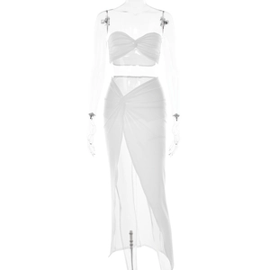 Detail shot of white two-piece set featuring pleated tube top and high waist slit maxi skirt