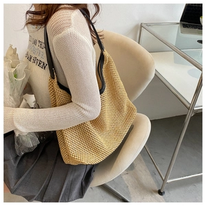 Chic beige woven mesh shoulder bag styled with an elegant summer casual outfit