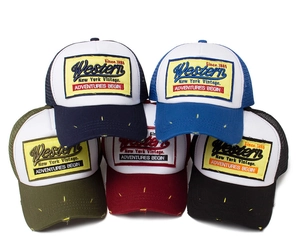 Multiple vintage washed cotton mesh baseball caps with embroidery patches in five colors