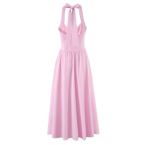 Elegant back view of pink halter neck maxi dress with large bow-knot and backless design