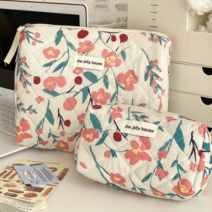 Quilted floral cosmetic bags set with cherry patterns and premium metallic zipper detail