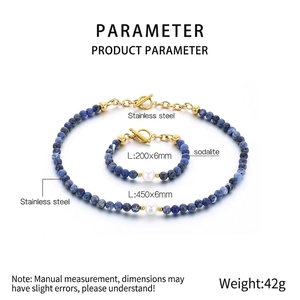 Detail of sodalite bead necklace and bracelet set with white pearl and gold toggle clasp
