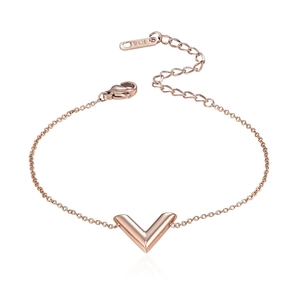 Macro shot of 18k rose gold V-shaped charm bracelet with K14 hallmark engraving