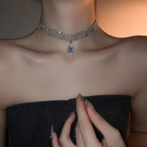 Sparkling multi-row silver choker necklace with a large teardrop zircon pendant