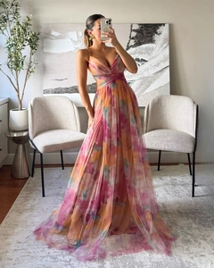 Detail of colorful floral print mesh maxi dress with waist cut-out and V-neckline