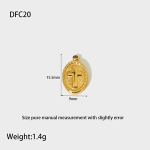 Golden oval cross pendant dimensions detail showing 15.5mm height and 9mm width