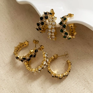Golden C-shaped stainless steel earrings with black, green and white zircon inlays