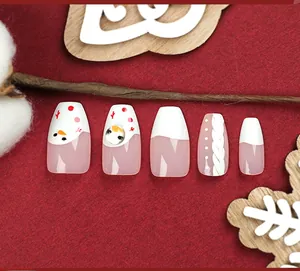 Faux ongles d'hiver avec motif bonhomme de neige, strass et texture pull en 3D