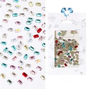 Macro shot of colorful rectangular crystal rhinestones for decorative nail art sets