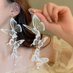 Boucles d'oreilles pendantes papillon en acrylique blanc avec perle élégante pour femme
