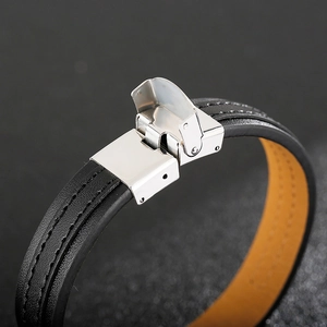 Men's black leather bracelet with silver stainless steel clasp and brown lining detail