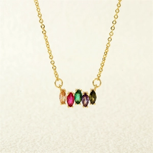 Detailed close-up of five colorful marquise gemstones on a gold-plated necklace