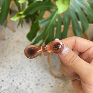 Amber brown translucent resin hair clip with Barrette La France gold lettering detail