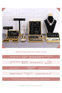 Detailed 16-piece set of black velvet and gold jewelry display stands for necklaces and rings
