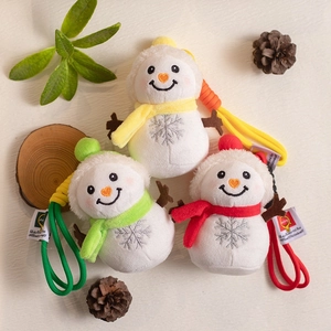 Three plush snowman charms in yellow, green, and red with embroidery and woven ropes