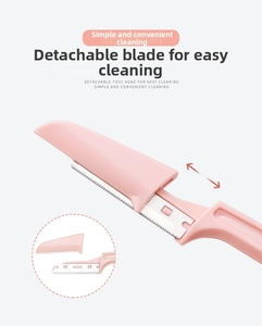 Detail showing detachable tool head and stainless steel blade of the pink eyebrow razor