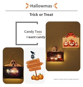 Detail of LED Halloween door hangers featuring ghosts, pumpkins and skull motifs
